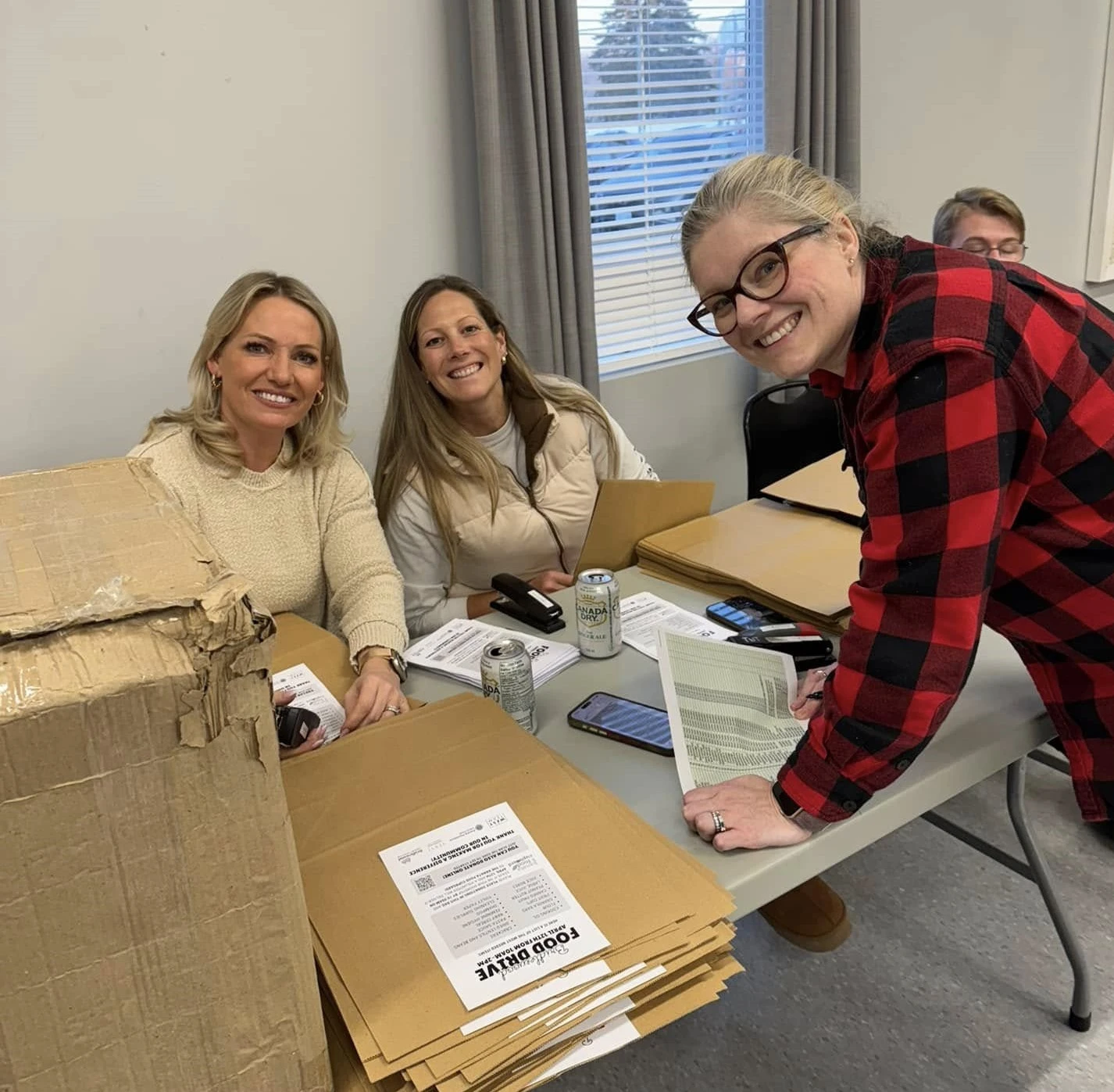 volunteers stapling bags
